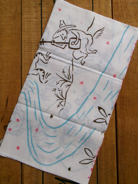 Japanese tenugui towel featuring cherry blossom and picnic scene, traditional fabric from Kamawanu with floral print design.