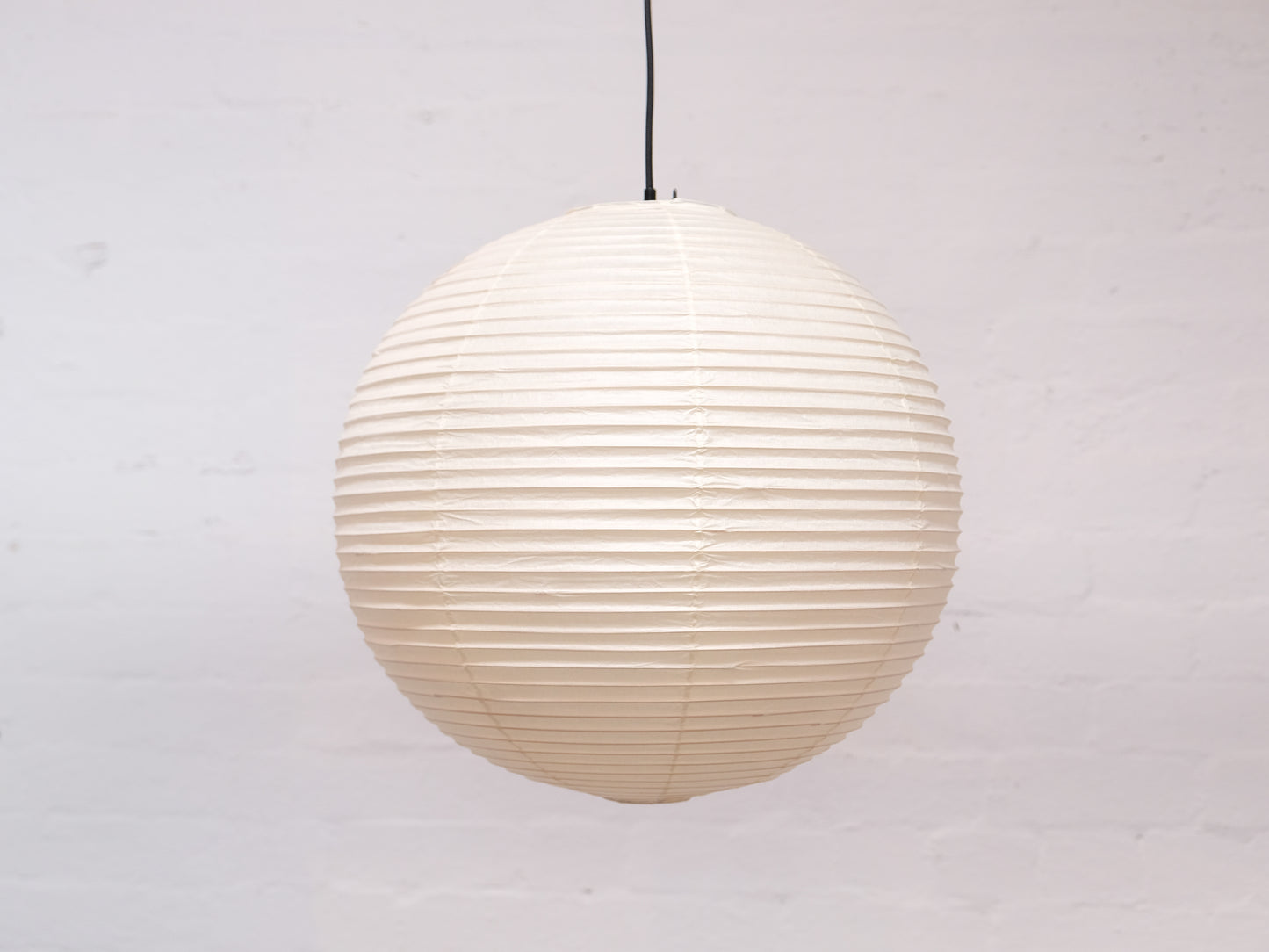 Akari 45A lamp shade in neutral color, designed for the Akari light fixture, showcasing its sleek, modern design.