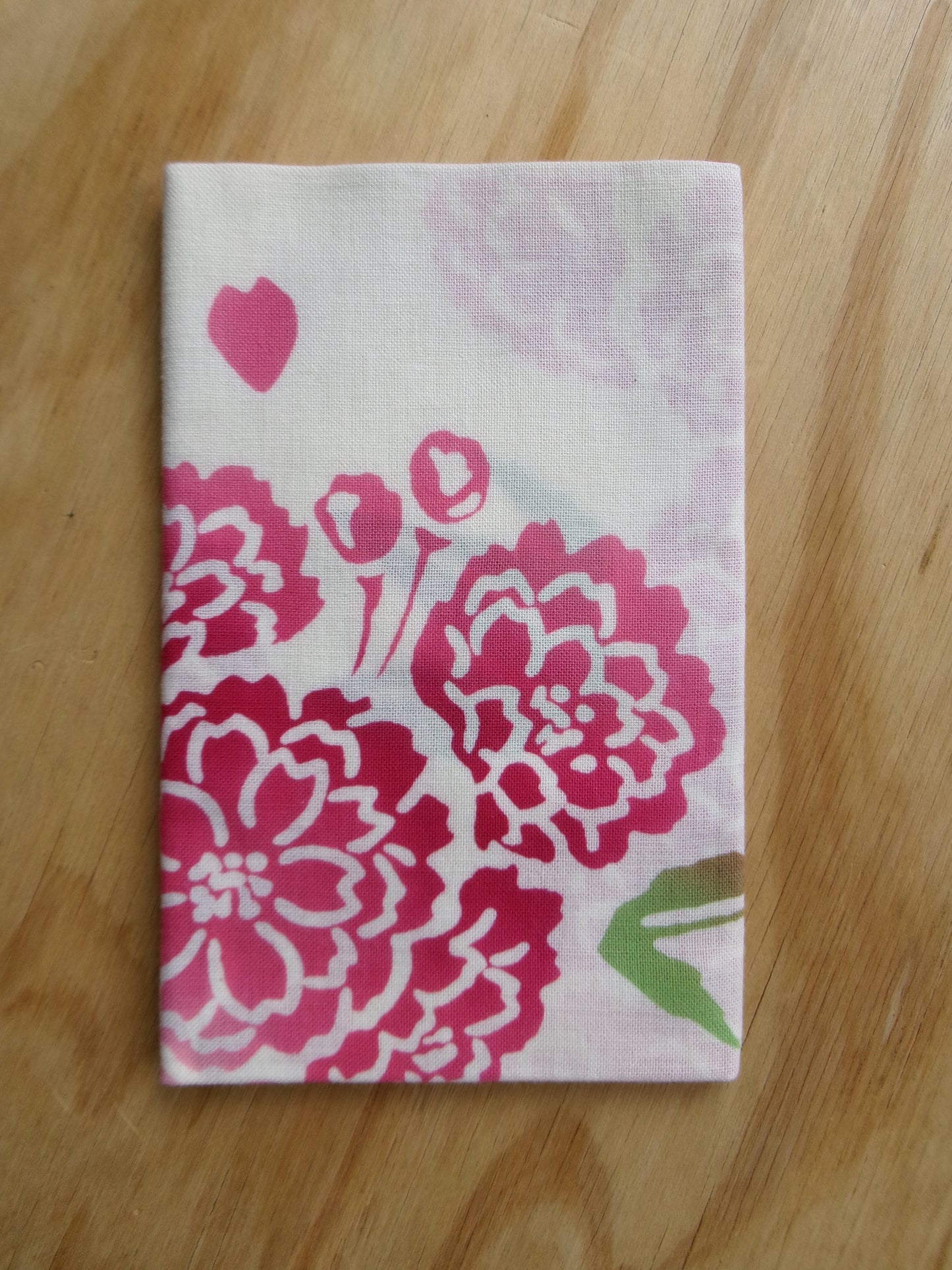 Framed tenugui with Yae Sakura cherry blossom design by Kamawanu, showcasing intricate floral artwork on fabric.