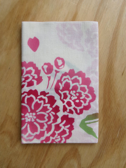 Framed tenugui with Yae Sakura cherry blossom design by Kamawanu, showcasing intricate floral artwork on fabric.