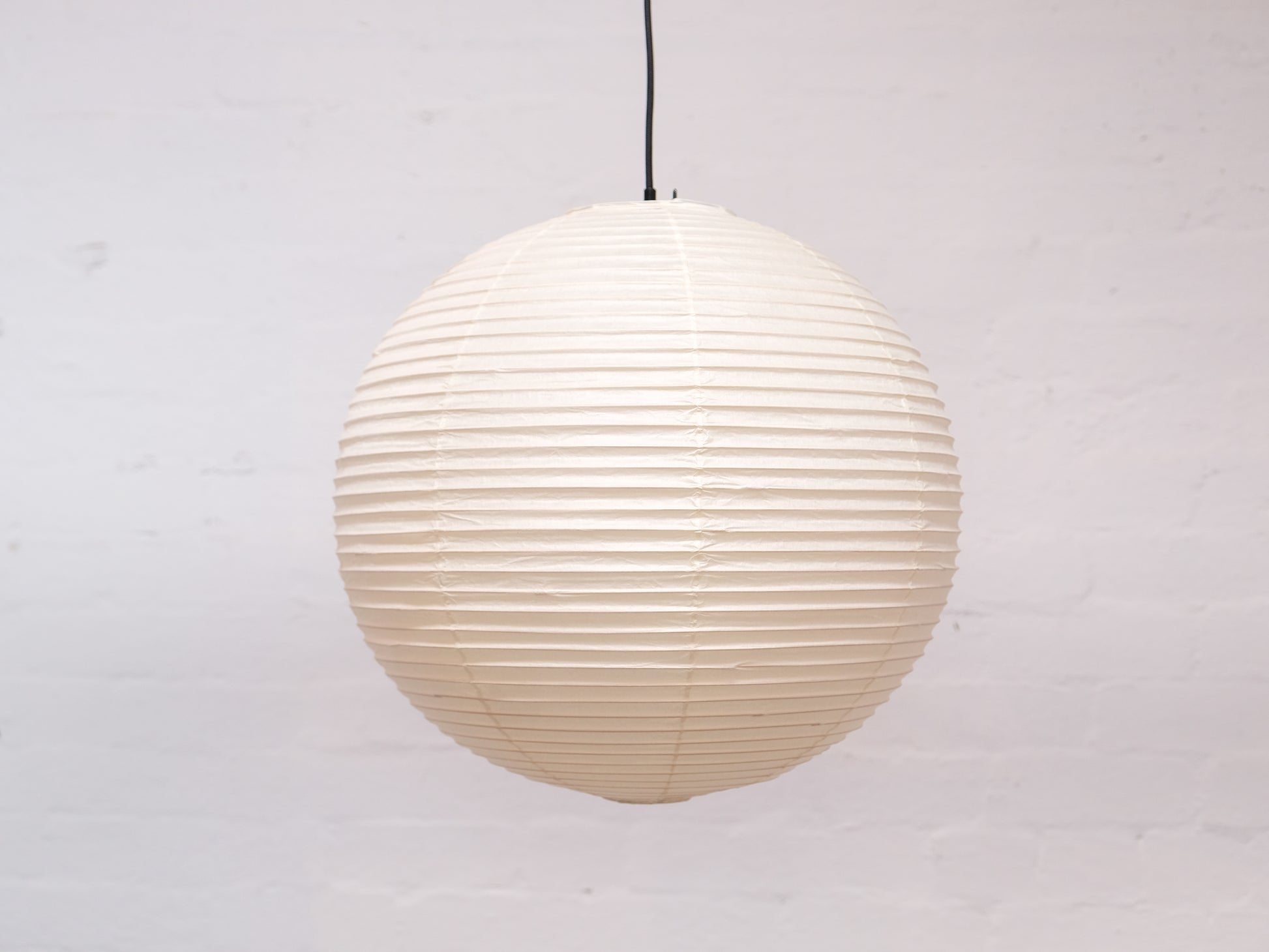 Akari 45A lamp shade in neutral color, designed for the Akari light fixture, showcasing its sleek, modern design.