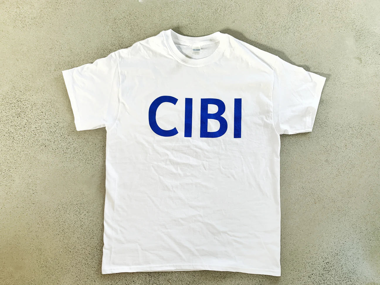 CIBI TOKYO STORE men's T-shirt featuring a casual fit and minimalist design, shown in black with a round neckline.