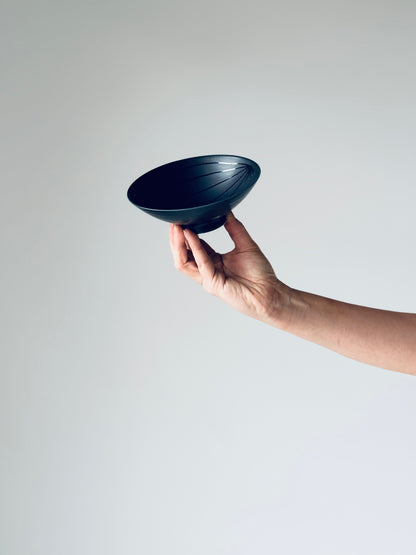 White porcelain tea bowl U-15 by Hakusan Ceramic, featuring a simple round shape and smooth glazed surface.