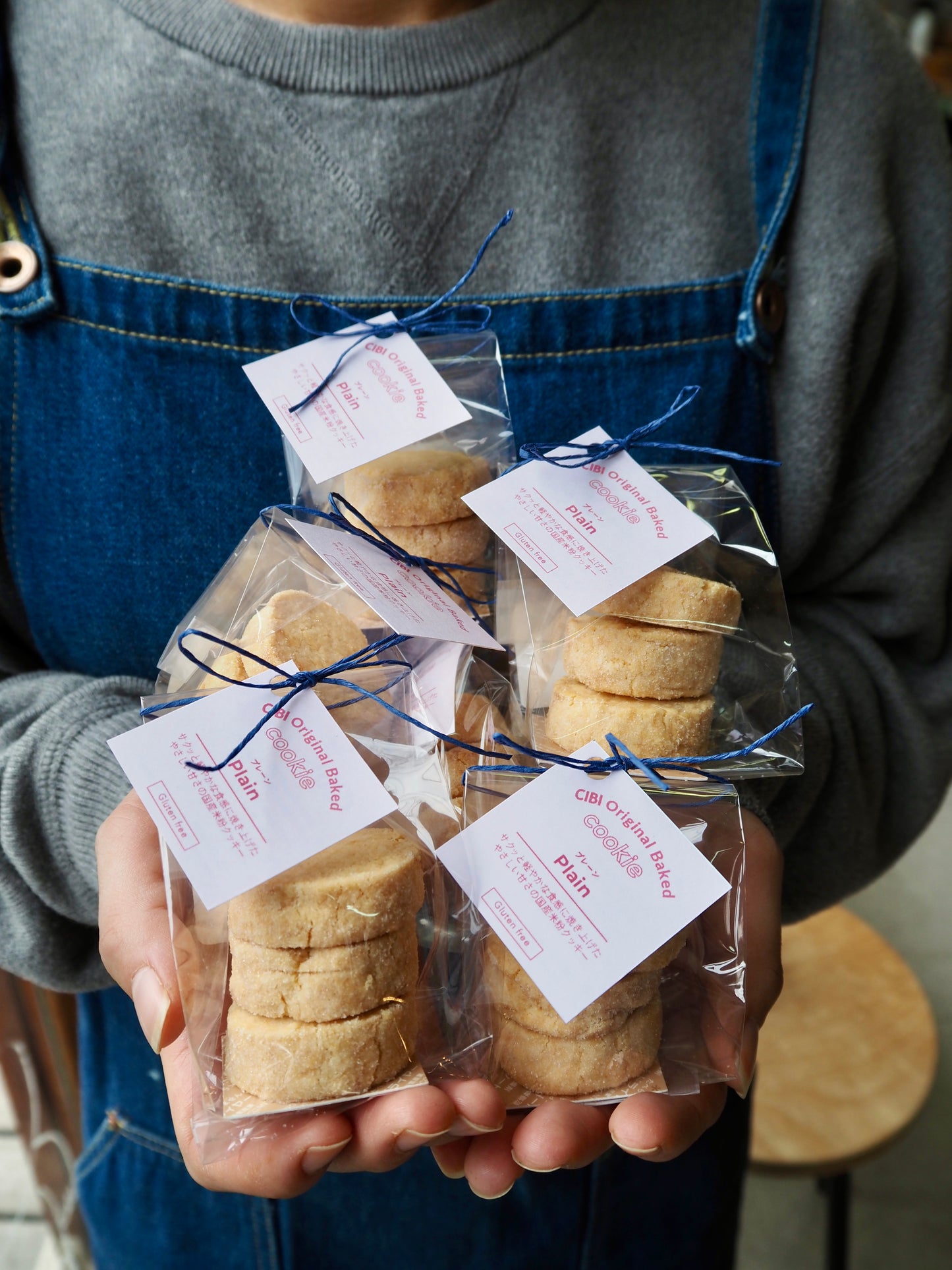Japanese rice flour plain cookies from CIBI Tokyo Store, showing three crispy, golden-brown cookies on a white plate.