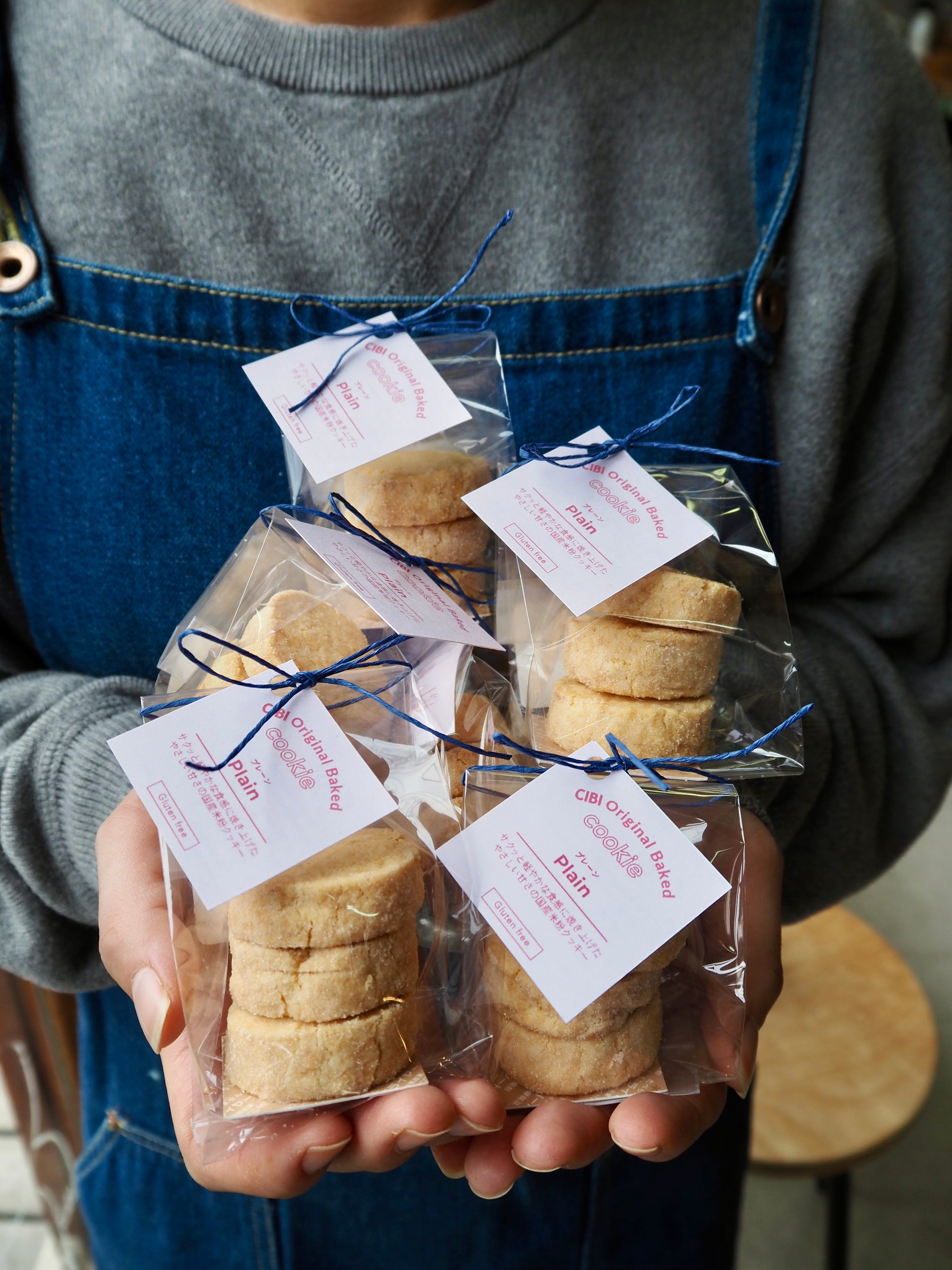 Japanese rice flour plain cookies from CIBI Tokyo Store, showing three crispy, golden-brown cookies on a white plate.