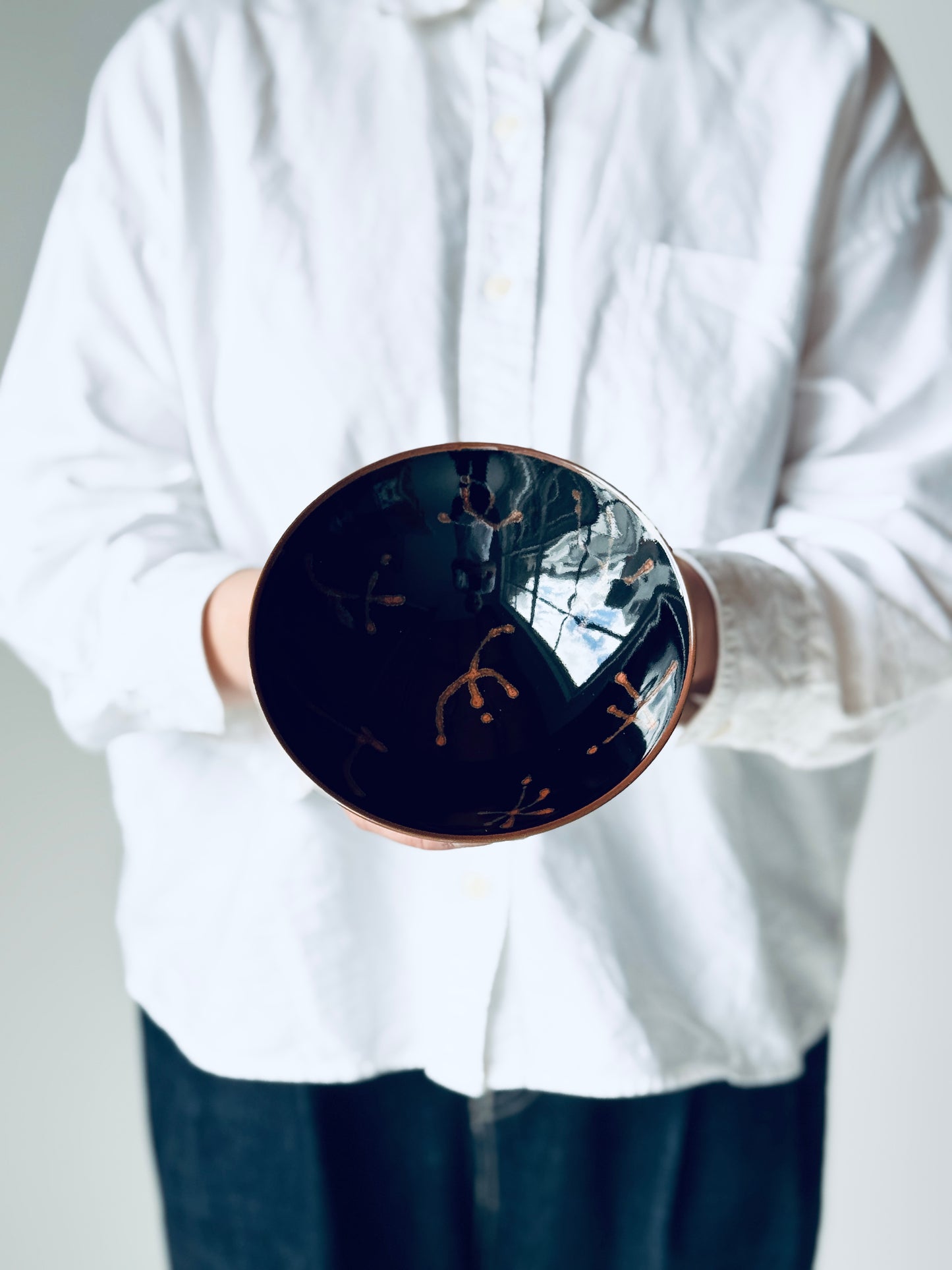 White Mountain pottery E-7 plain tea bowl with a smooth, rounded shape and traditional design, suitable for tea ceremonies.