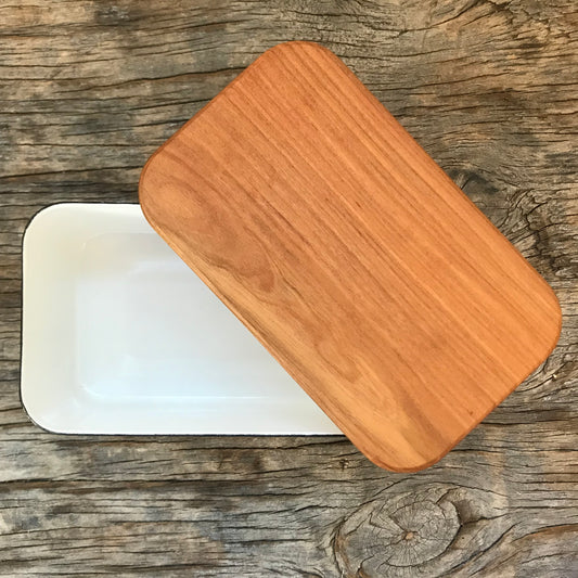Noda Horo Enamel Butter Case L showing a sleek white enamel container with a lid, designed for storing butter.