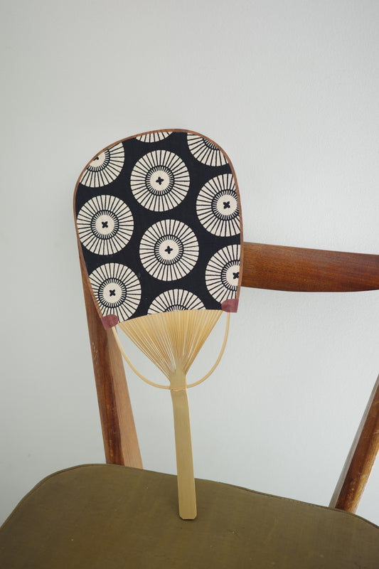 Japanese rectangular fan by Kamawanu featuring traditional design, made of wood and paper, perfect for summer use.