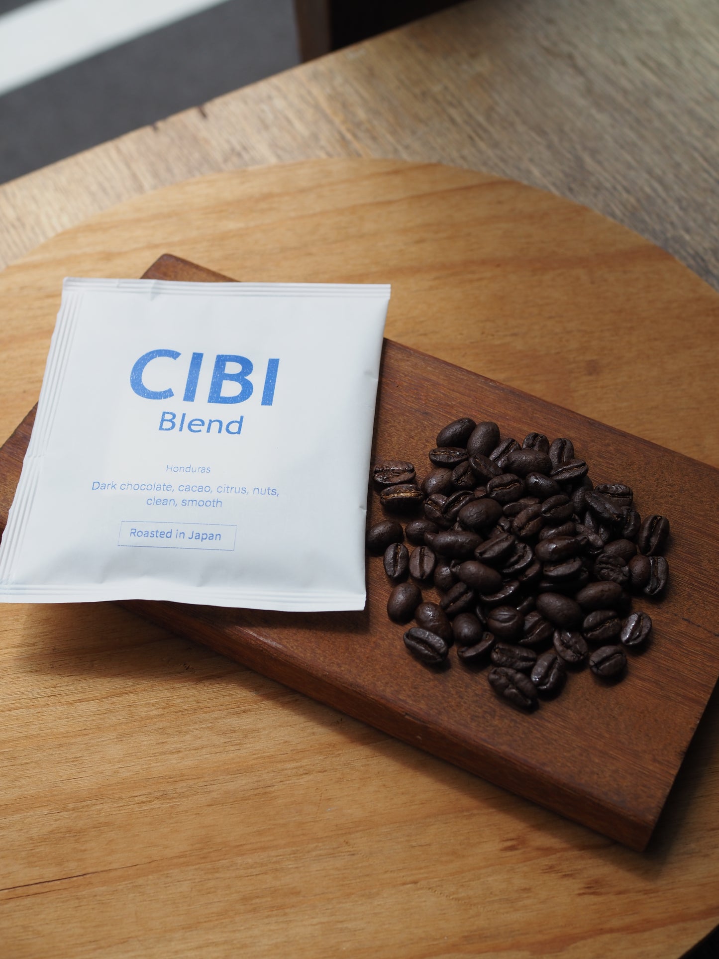 CIBI Blend drip bag coffee pack showing a single-serving coffee sachet with branding and brewing instructions.