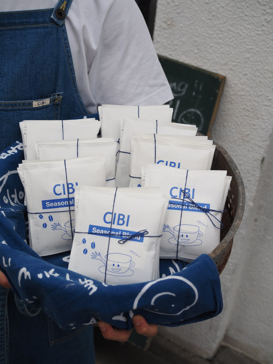 CIBI Seasonal Blend drip coffee bag with vibrant packaging, showcasing a fresh and aromatic coffee experience.