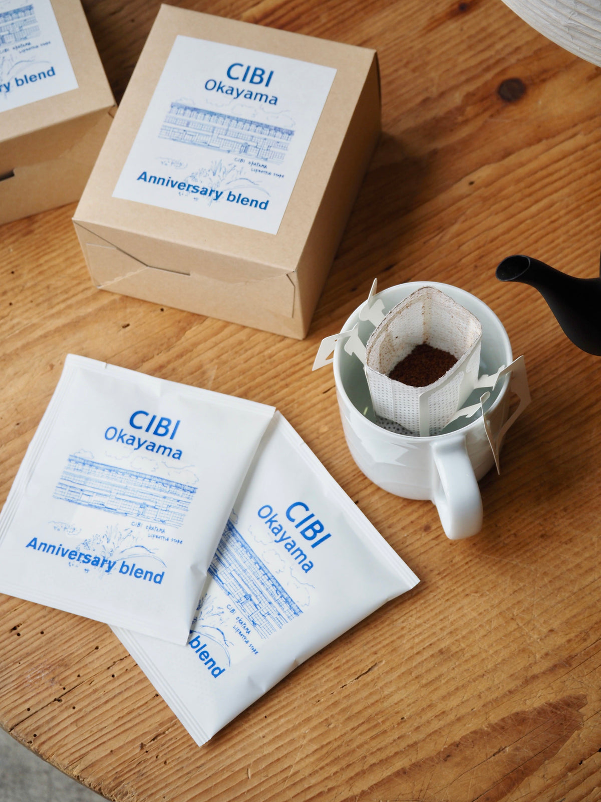 CIBI Okayama Anniversary Blend drip coffee bag with rich, aromatic coffee in a convenient single-serve pack.