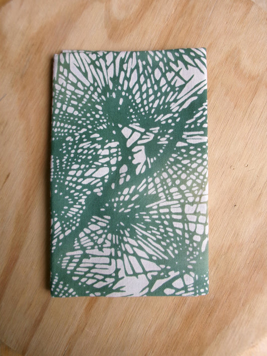 Japanese tenugui towel with blurred pine tree design by Kamawanu, showcasing traditional indigo fabric and artistic shading.