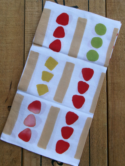 Colorful tenugui towel featuring a fruit sandwich pattern from the かまわぬ brand, showcasing bright fruit illustrations.
